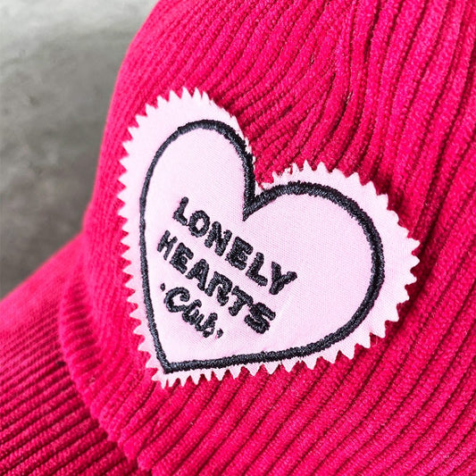 GORRA LONELY HEARTS CLUB VINO