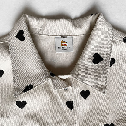 CHAQUETA MARFIL CORAZONES NEGROS