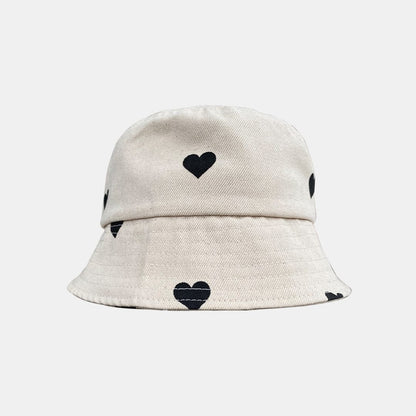 BUCKET HAT MARFIL CORAZONES NEGROS